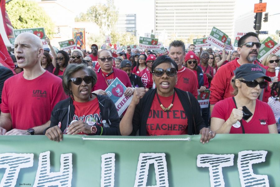 LAUSD teachers march in protest for increasing benefits. 