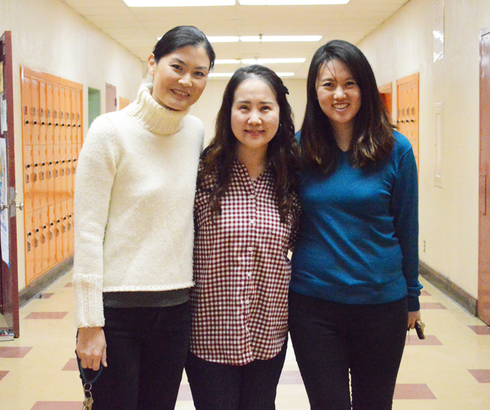 Ms. Shim pictured with other teachers and friends, Ms. Kim and Ms. Park, on campus. 