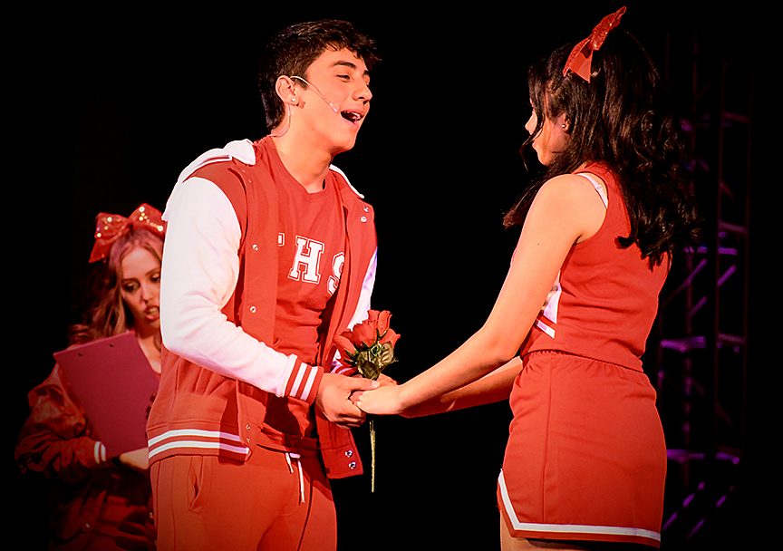 Steven, played by Nicholas Bowler, sings to calm down his girlfriend and new captain of the Truman High Buccaneers, Campbell Davis, played by Natalie Chavez.