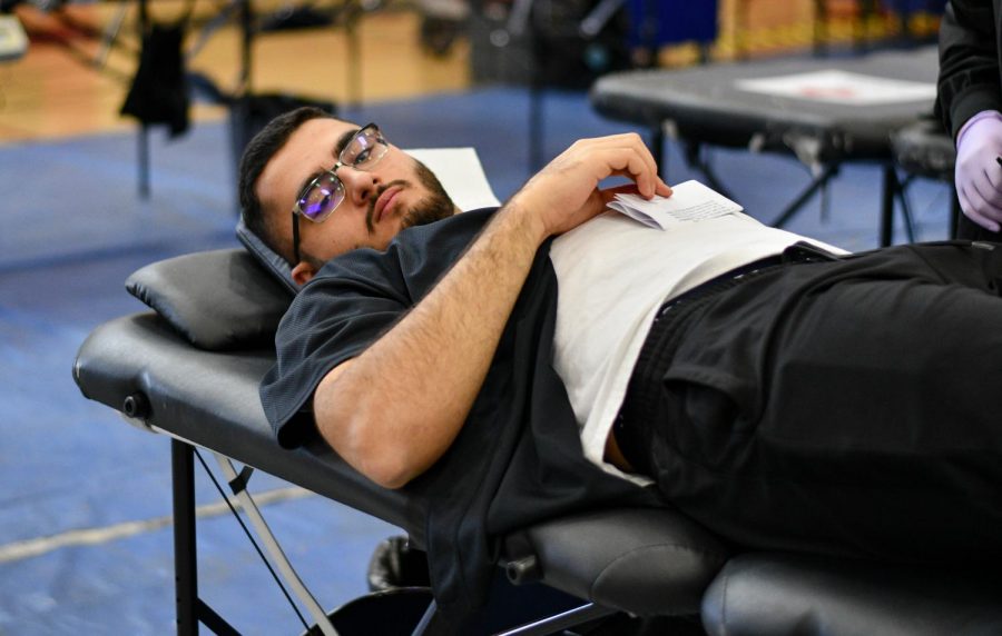 As the blood drive begins on Nov.19, 2019, John Ohanian gets his blood drawn out by one of the nurses. Each bag of blood saves lives.