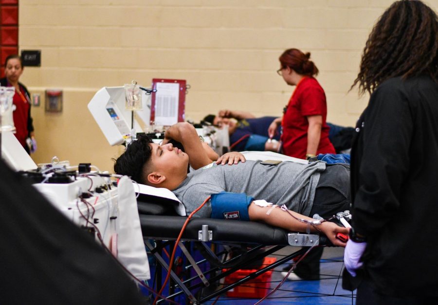 At this years annual blood drive on Nov.19, 2019, Markus Garcia waits as his own blood gets drawn out of him.