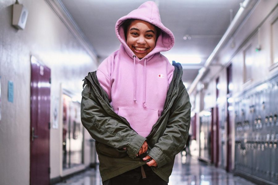 Bella Thomas bundles up to keep it appropriate as she follows the school dress code.