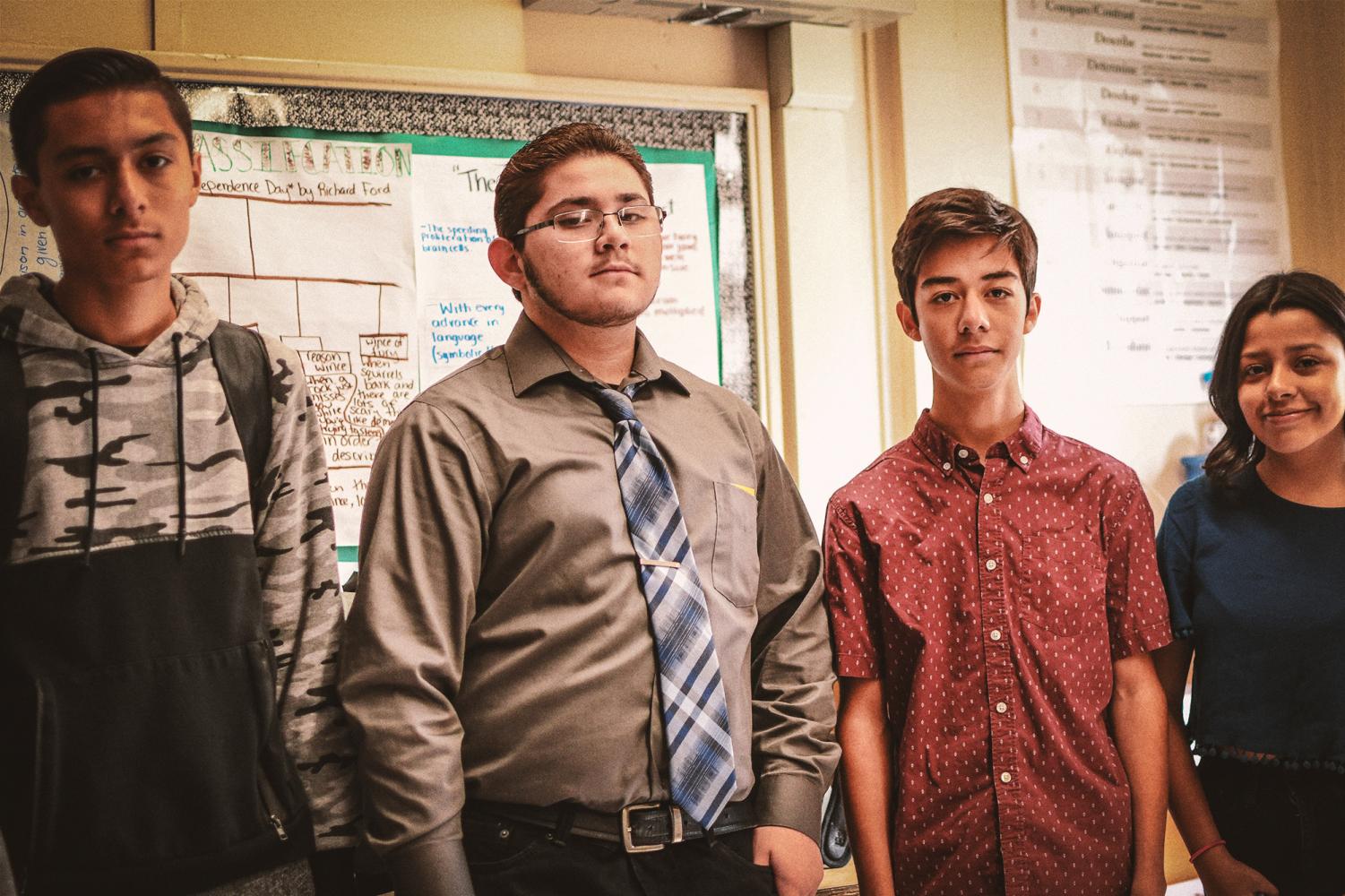 Students promote donations to charities in 10th grade English class