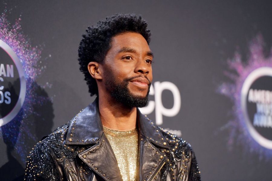 Chadwick Boseman  poses at the American Music Awards