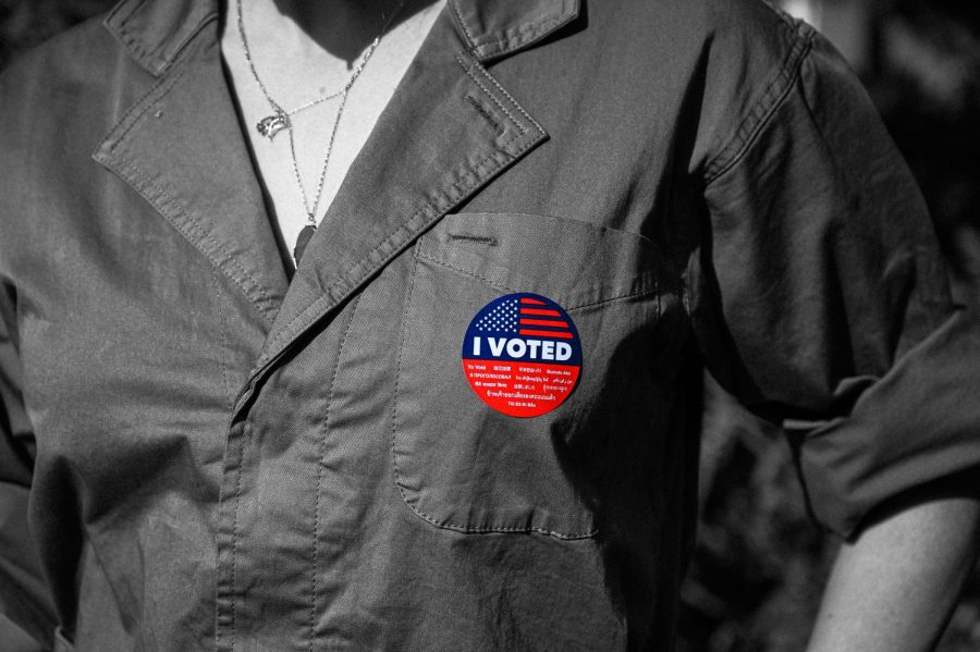 A voter shows off their sticker for voting in Beverly Hills City Hall on Election Day. (NOV 3, 2020) 