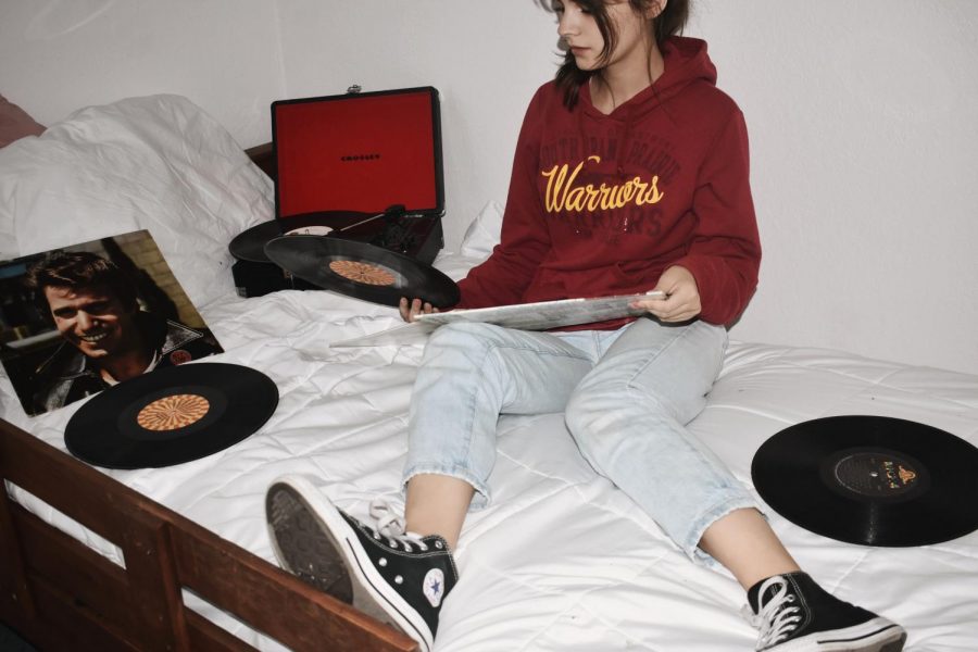PLAYER Spinning vinyl in the bedroom.