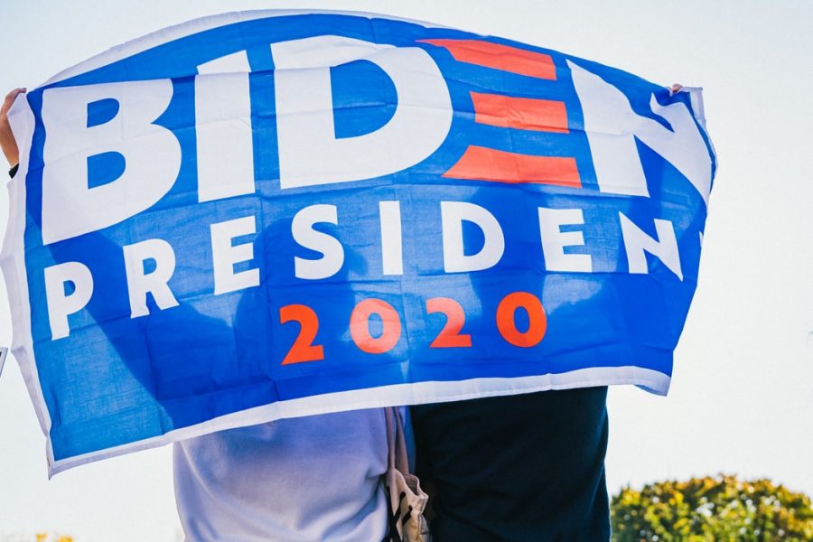 BIDEN PRIDE Supporters hoist their flag for Democrat presidential nominee Joe Biden.