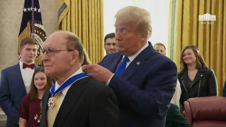 President+Donald+Trump+puts+the+Medal+of+Freedom+around+Dan+Gables+neck.