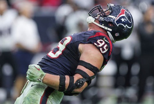 Sack! Number 99 J.J. Watt celebrates after tackling the opponents quarterback.