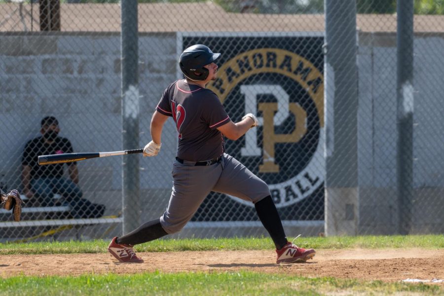 #12 Steven Tostado hitting a homerun vs Panorama High School. When facing Monroe on Wednesday he threw 110 pitches pulling the wolves through the first half of the game.