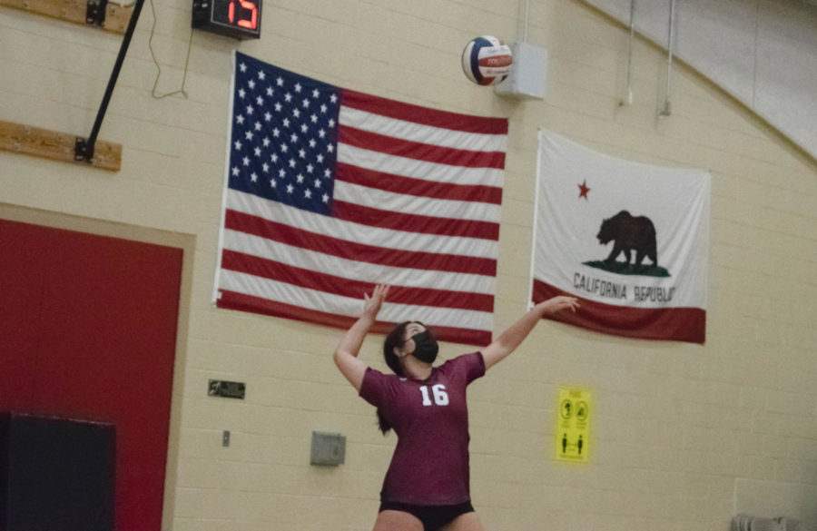 Alexis Austria (#16) serves to Northridge High School at the Girls volleyball home game on Sept. 1, 2021. This was the wolfpack’s first volleyball game of the season. The squad lost their first game with a final score of 25-8, 25-12, and 25-19. 