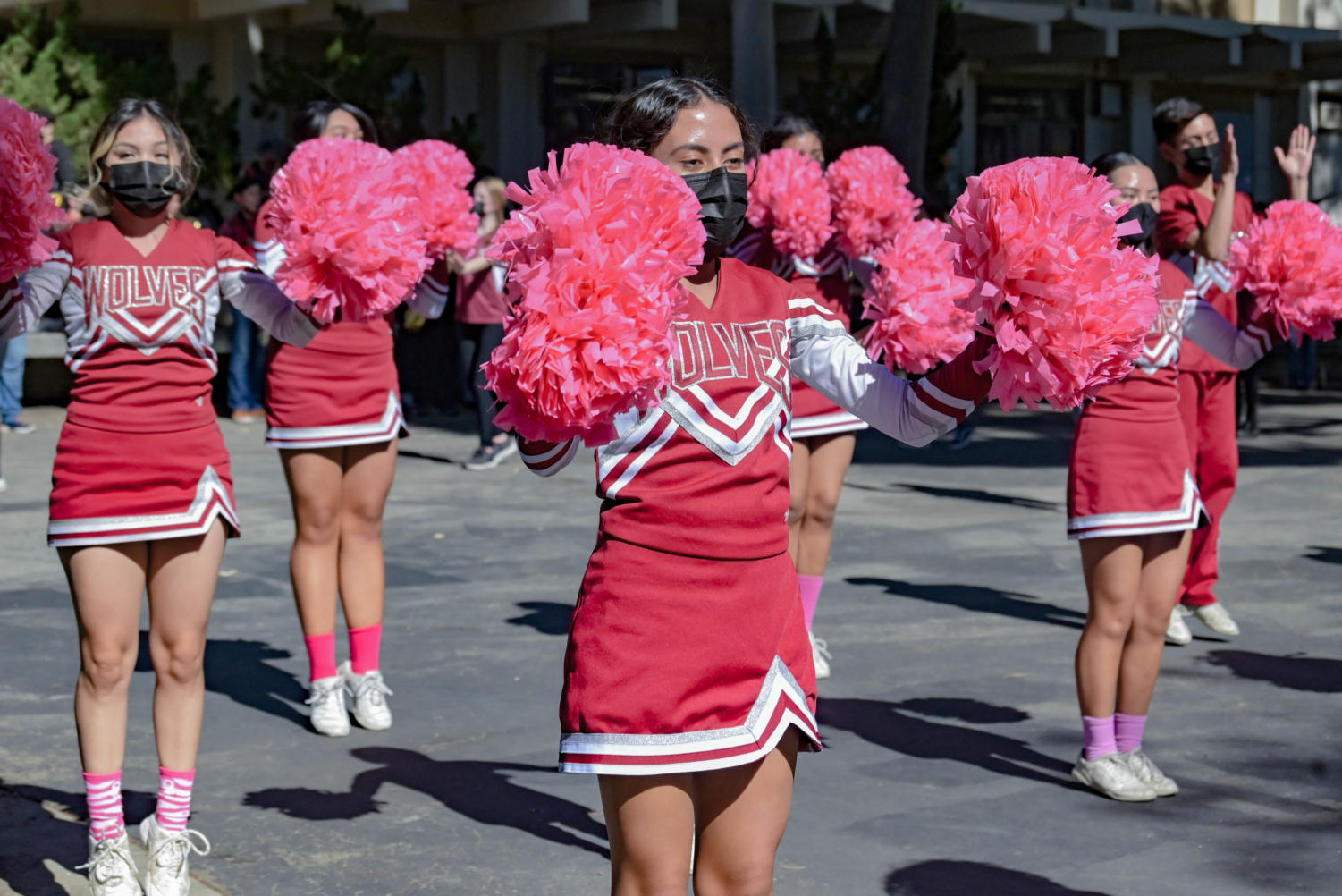 Cheer team shines in the final football pep rally of the year