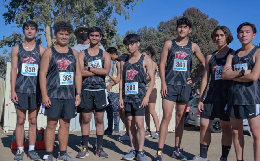  Pose and smile: The boys JV team is all smiles as they prepare to start their race.