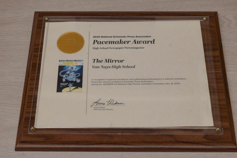 Repeat winners: The Mirror wins a second-in-a-row National Scholastic Press Association Pacemaker Award for the print edition under last years Editors-in-Chief Andre Rodas and Ani Tutunjyan.