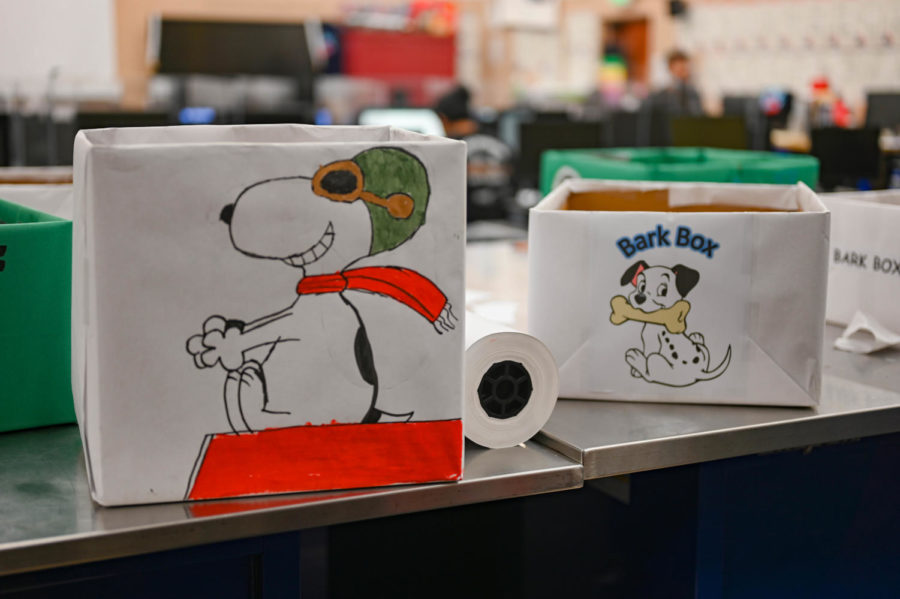 Famous celebrities: These boxes display drawings and prints of classic dogs like Snoopy and one of the 101 dalmations. 