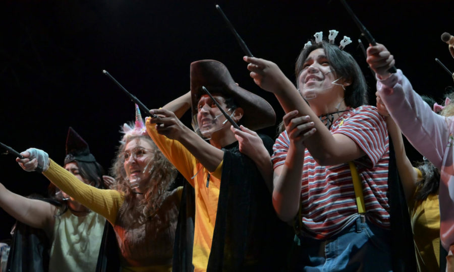 Breeana Gerdes, Gover Olivares, Sebastian Estrada and the rest of the Puffs come together during a humorous scene in the first act. 