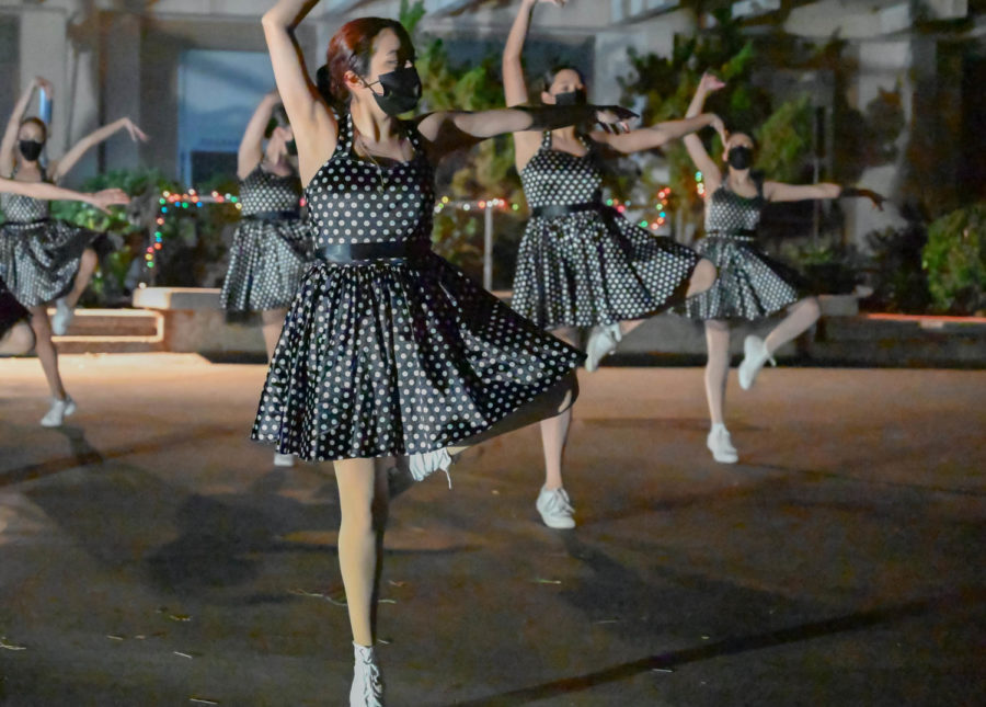 HOLD AND POSE:  Senior Jenifer Zermeno dances for Ms. Hula’s dance company on the quad. 