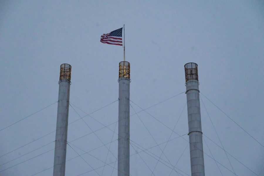 An American flag placed atop the Old Mill Smokestacks just days after the 9/11 terrorist attacks, still waves in rain or shine. 
