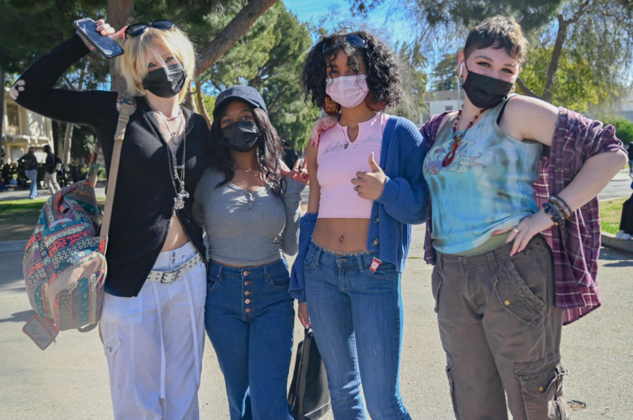 A Blast To The Past: (From Left to Right): Ella Robinson, Eden Newson, Kennedy Strickland and Harley (last name) brush off their 2000’s fashion on Y2K Tuesday.
