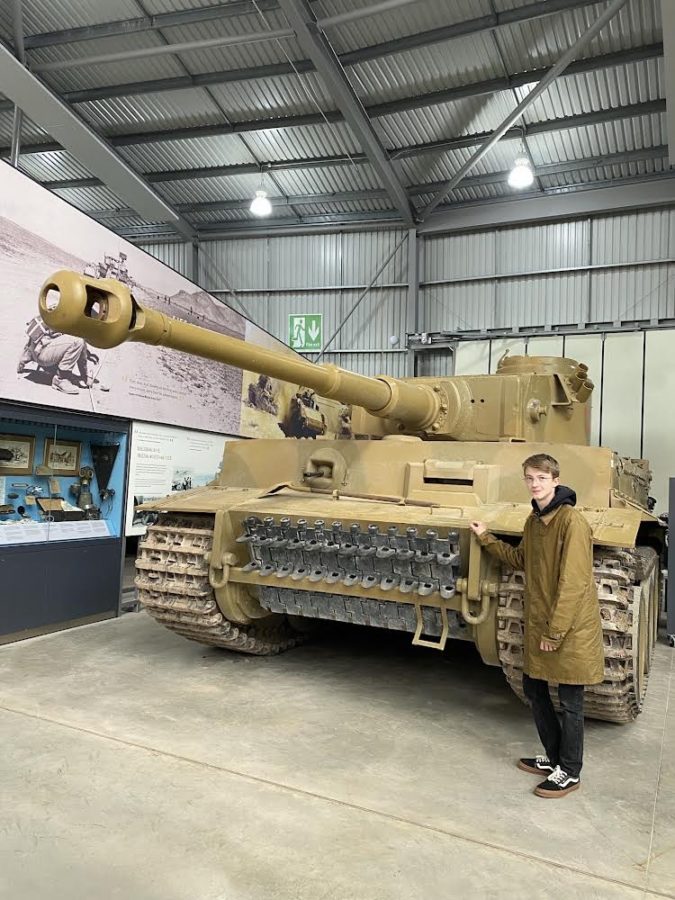 Max Kalvan appears next to a tank. 
