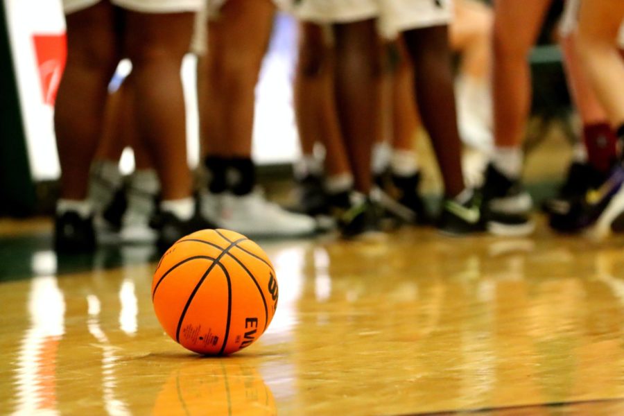 The ball is passed to girls basketball as they start their season