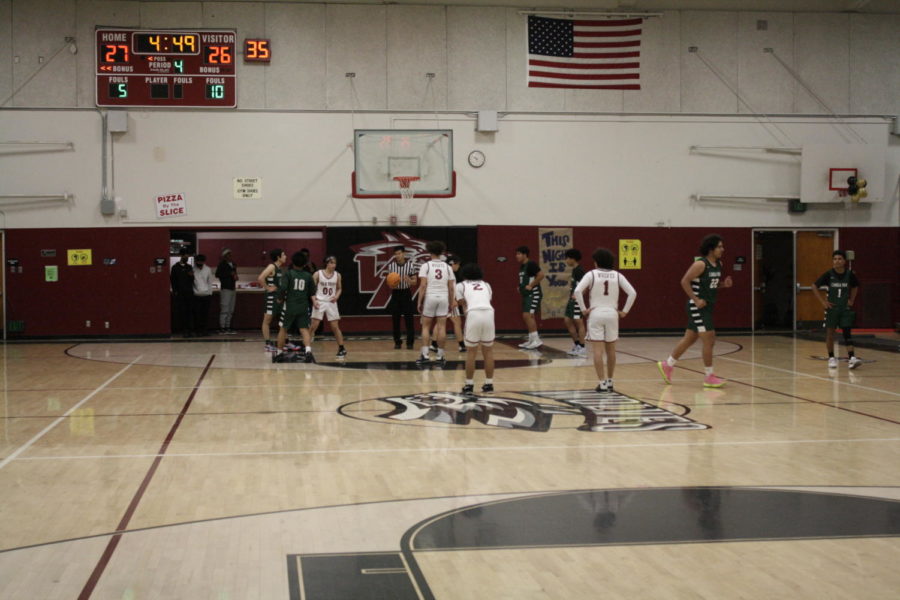 Josh Molina, #3, drove to the basket and made the layup while getting fouled, giving him a three point play