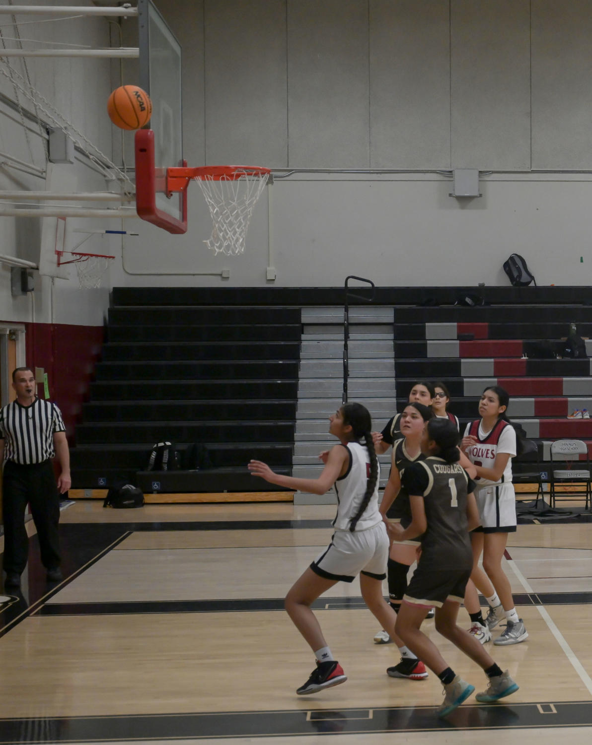 The girl’s basketball team loses their winning streak against the Kennedy Cougars