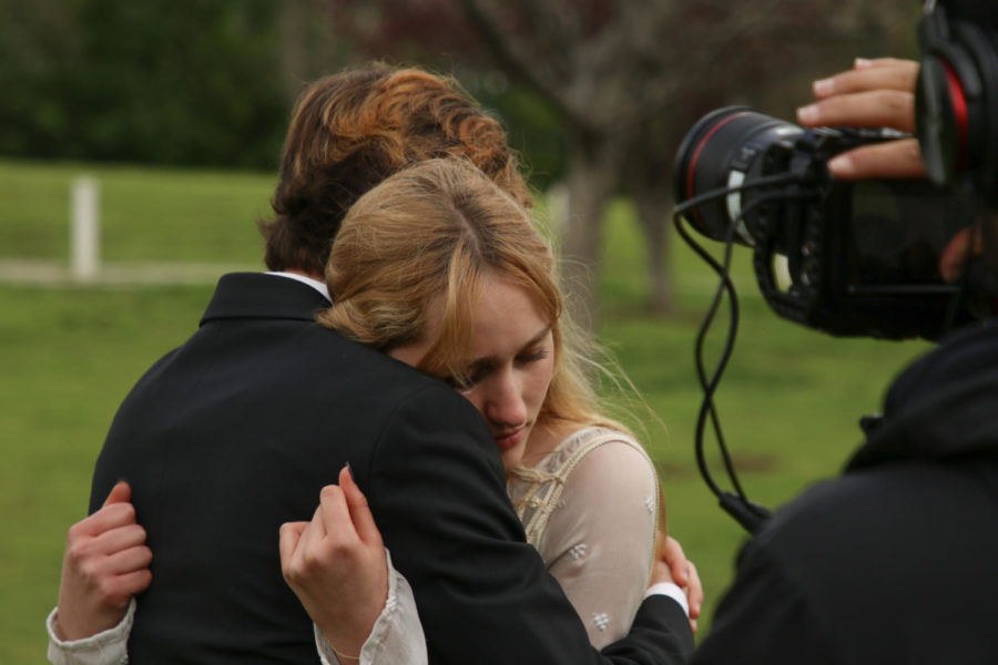 Actors Dante Damiano (left) and Aurora Cardonna get into character as the camera begins rolling.
