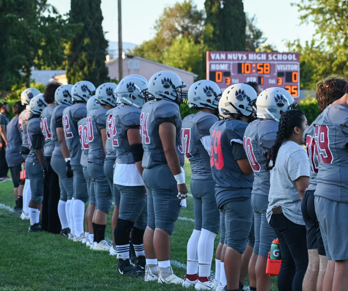 The Van Nuys High School Wolves line up as they are about to start their first football game of the season, on August 18th, 2023.
