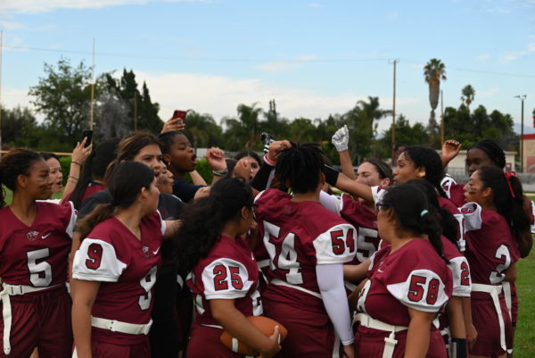 Van Nuys players let out a rallying cry after a time out