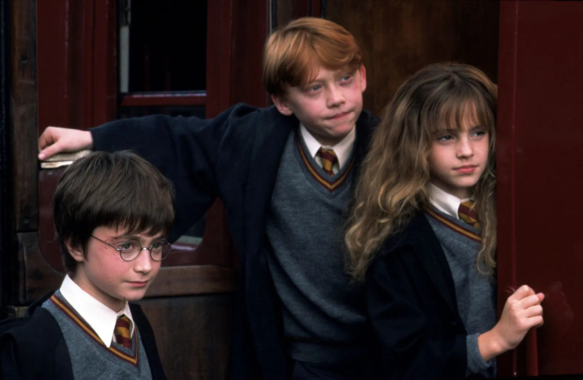 From L to R: Daniel Radcliffe as Harry Potter, Rupert Grint as Ronald Weasley and Emma Watson as Hermione Granger in Harry Potter and the Sorcerers Stone.