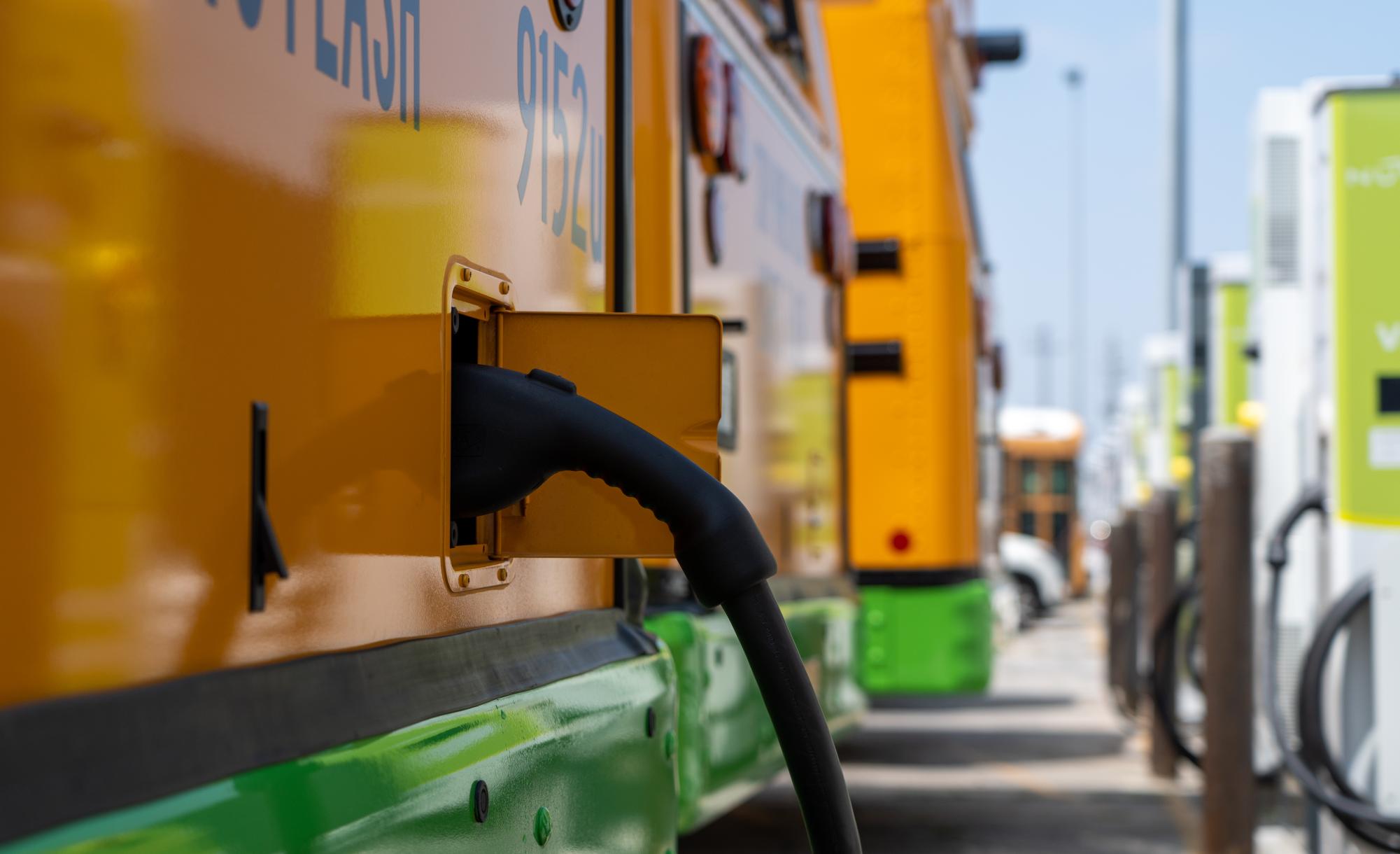 PLUGGING IN: One of the districts new electric school buses recharges at one of the 18 new charging stations that were recently installed at the Gardena Bus Yard in South L.A. LAUSD plans to completely electrify the fleet stationed in Sun Valley by 2026 by adding 180 new electric buses.