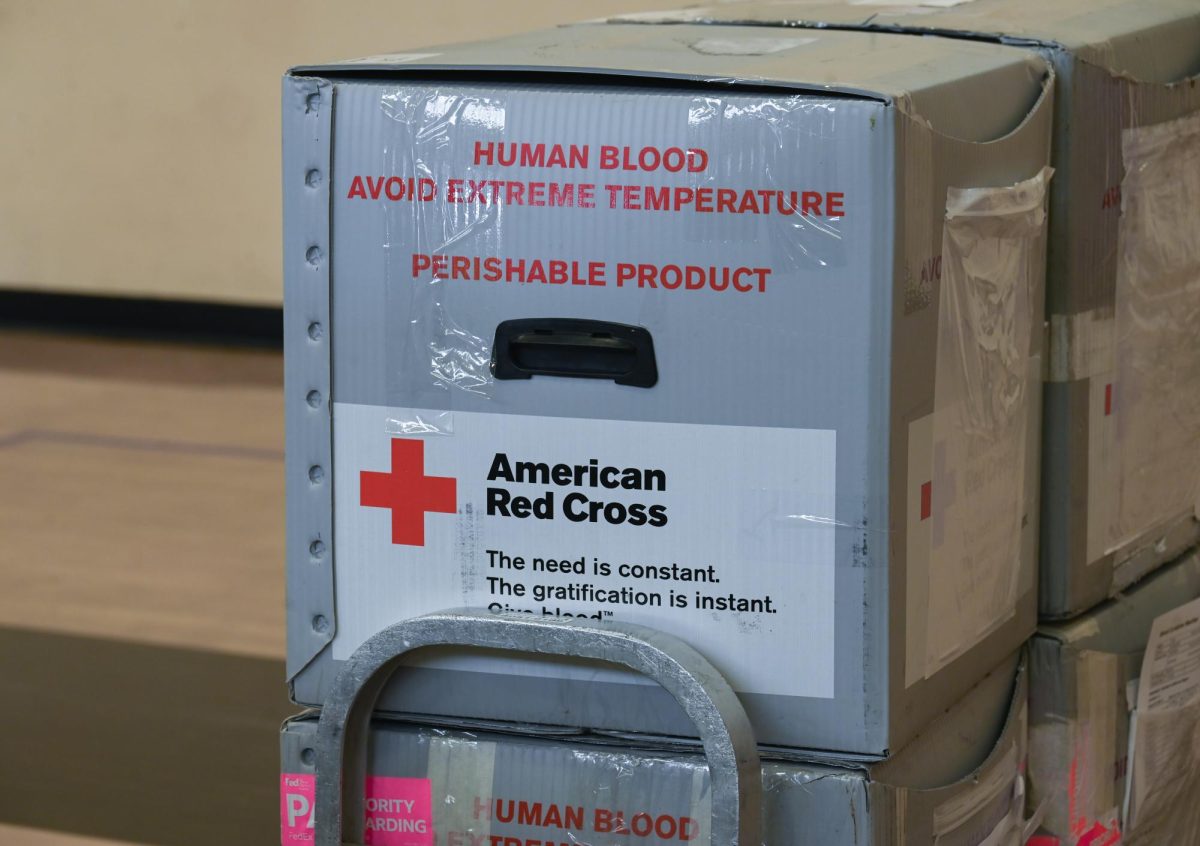 A box of human blood waits to be transported from the small gym during the Blood Drive on Nov. 14.