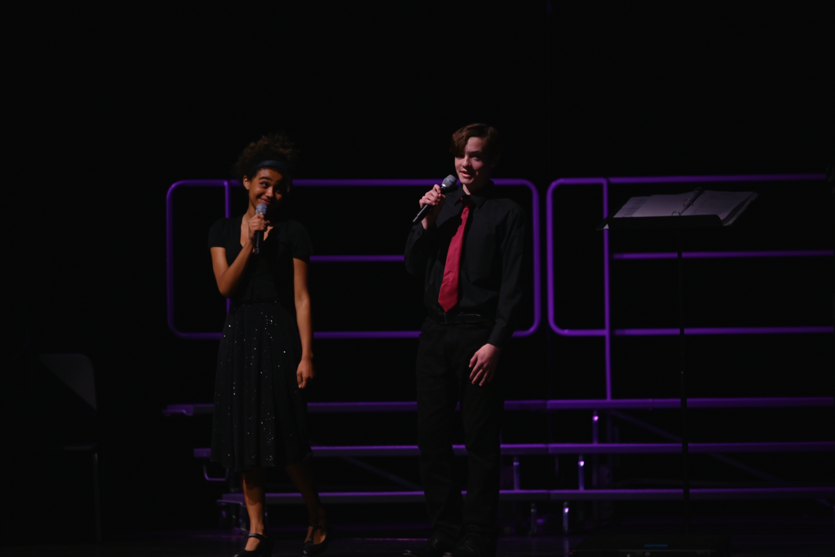Sophomore Connor Ruckman and junior Madison Braybon singing Baby Its Cold Outside.