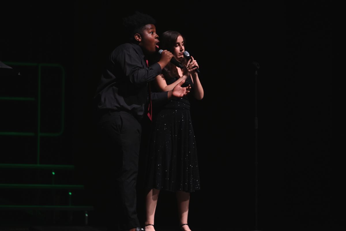 Sophomore Dilan Patton and senior Lilit Aprahamian singing John Legends rendition of Have Yourself a Merry Little Christmas.
