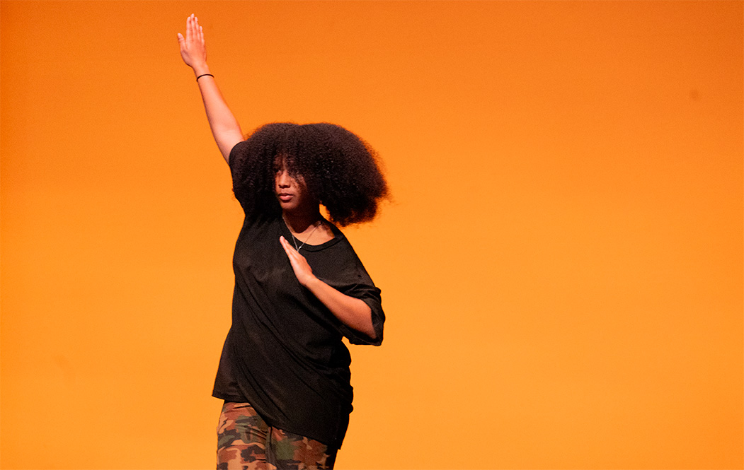 Jurnee Joseph performs a step routine at the Black History Concert taken place on Friday, Feb. 16.