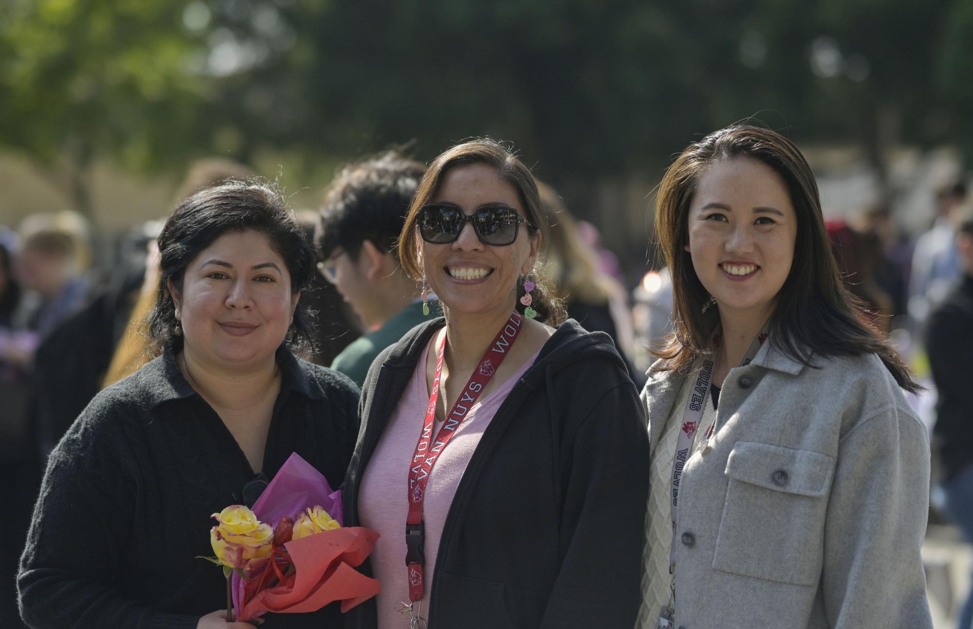From L to R: Ms. Milagro Medrano, Ms. Elizabeth Torres and Ms. Michelle Park hang out on the quad, listening to the fun music and enjoying the vibrant environment.