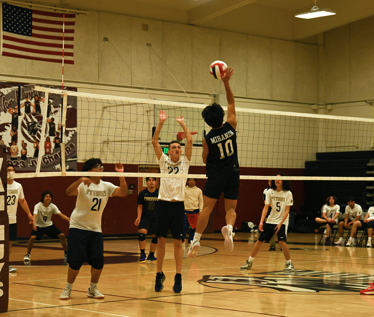 Starter JV outside hitter Yeerdlee Miranda (#10) spikes a ball against the Panorama Pythons at a home game on April 3.