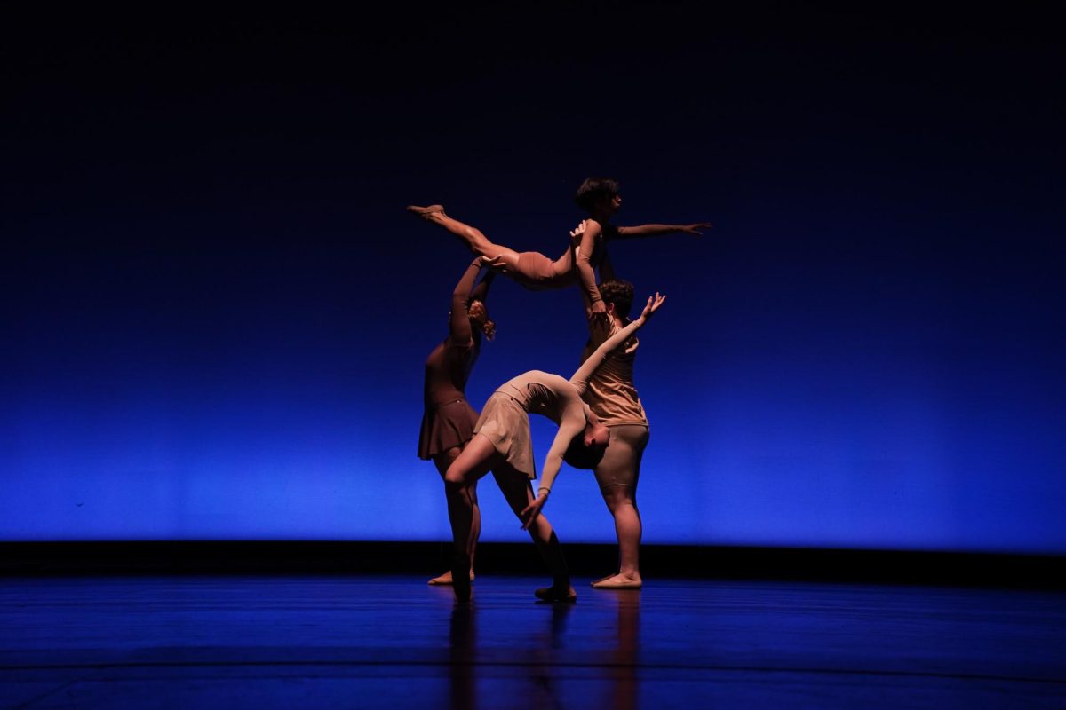 Ms. Hula's Dance Company members showed off their technique in a five-minute ballet number. (Lighting Design: Ethan Rodda)