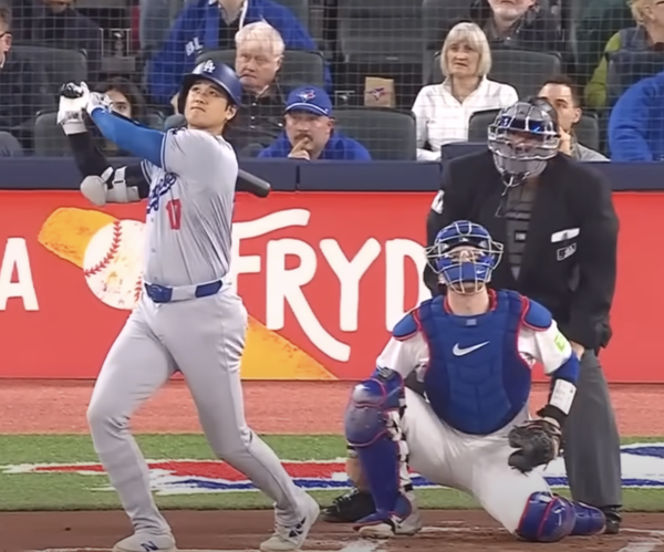Shohei Ohtani at bat early in the season. His interpreter, Ippei Mizuhara, recently got in a scandal that accused the interpreter of stealing $4 million from his employer and friend.