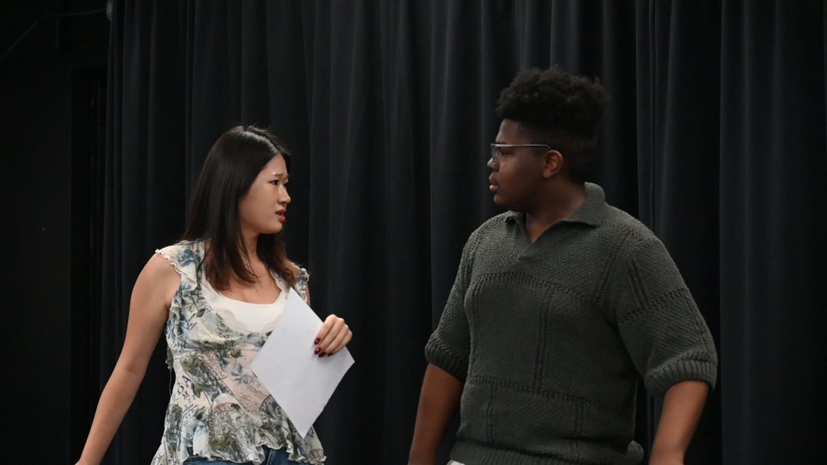 (From L to R) Senior April Cho and Junior Dilan Patton work together to perform a scene for theatre director Mr. Justin Baldridge.