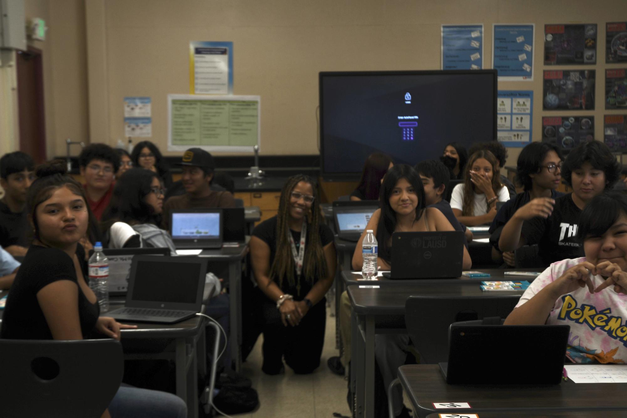 Ms. Mitchell poses with her period 5 Biology class, as she celebrates her first week of being a Van Nuys High school teacher. 