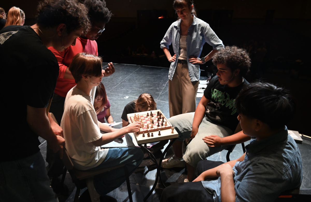 As chess is often used throughout the show, both the cast and crew have developed quite the fascination for the game, often playing before rehearsal and during breaks.