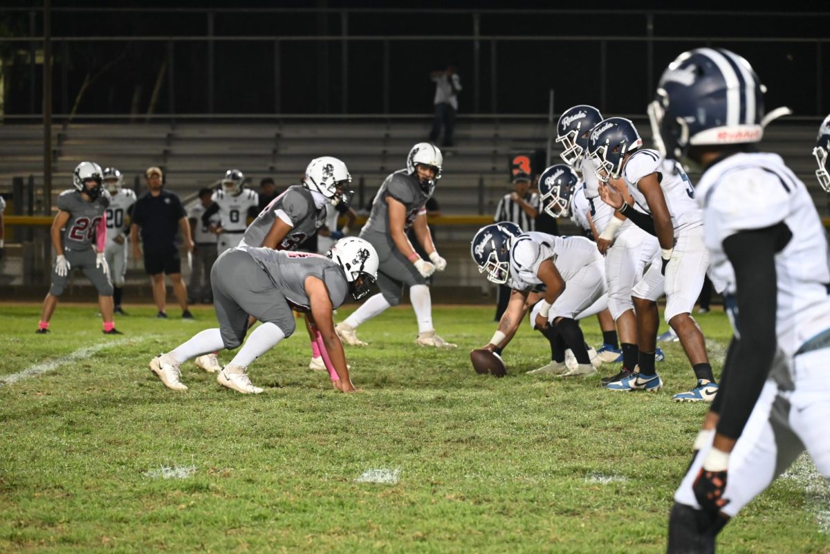 VNHS football team getting into position and facing Reseda in the second quarter.