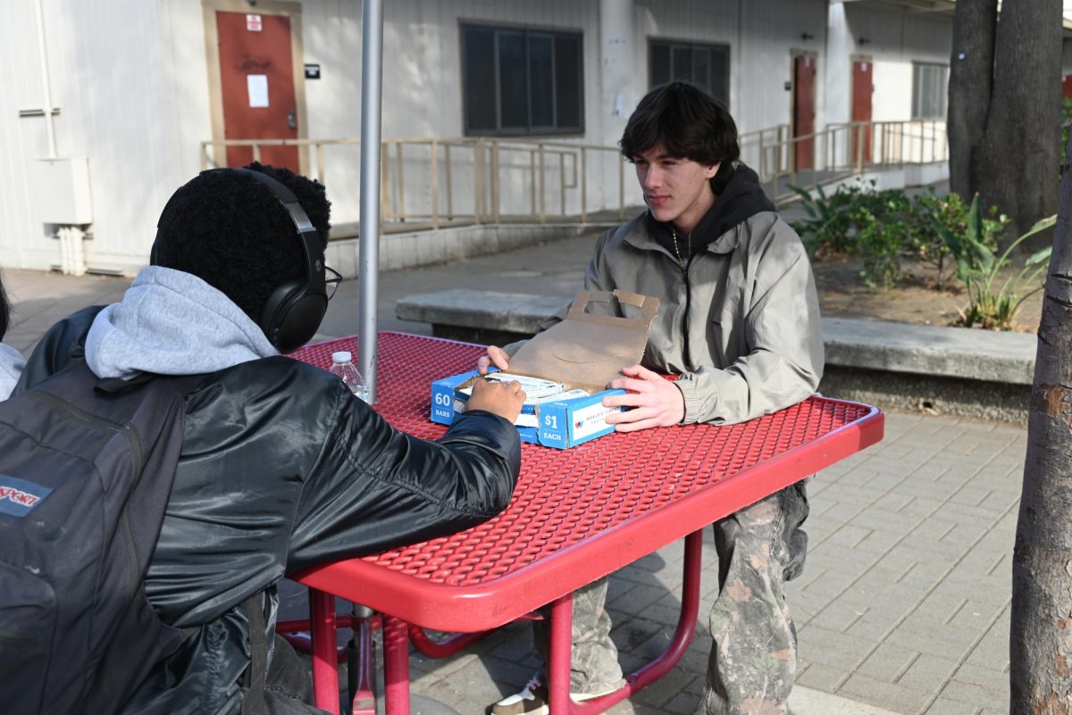 Students are selling "World's Finest Chocolate" to raise funds for school activities. The initiative encourages business skills and community involvement.