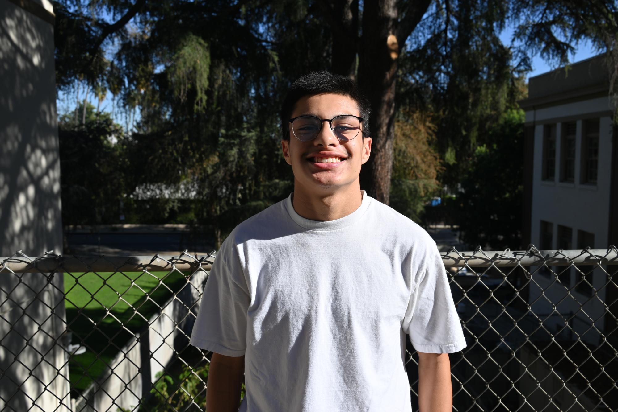 Chris Gomez, a standout athlete at Van Nuys High, embraces the challenges and rewards of playing varsity football, finding strength and purpose on and off the field.