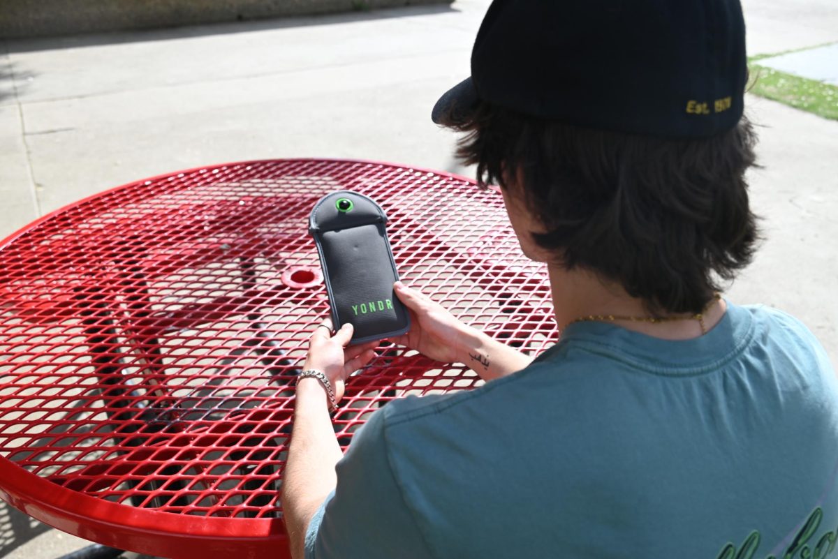 Van Nuys High School students receive Yondr pouches in a district-wide effort to reduce classroom distractions.