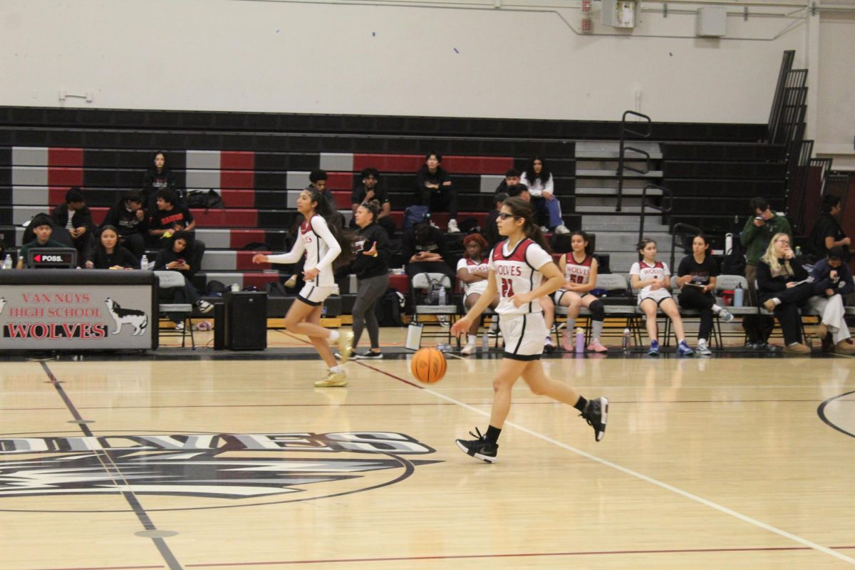 Player 10 runs across the court after a turnover. 