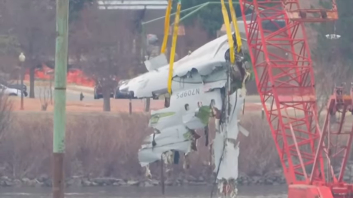 Footage of debris being removed from the Potomac River, as efforts are made to recover bodies from the fatal passenger plane and army helicopter crash. 