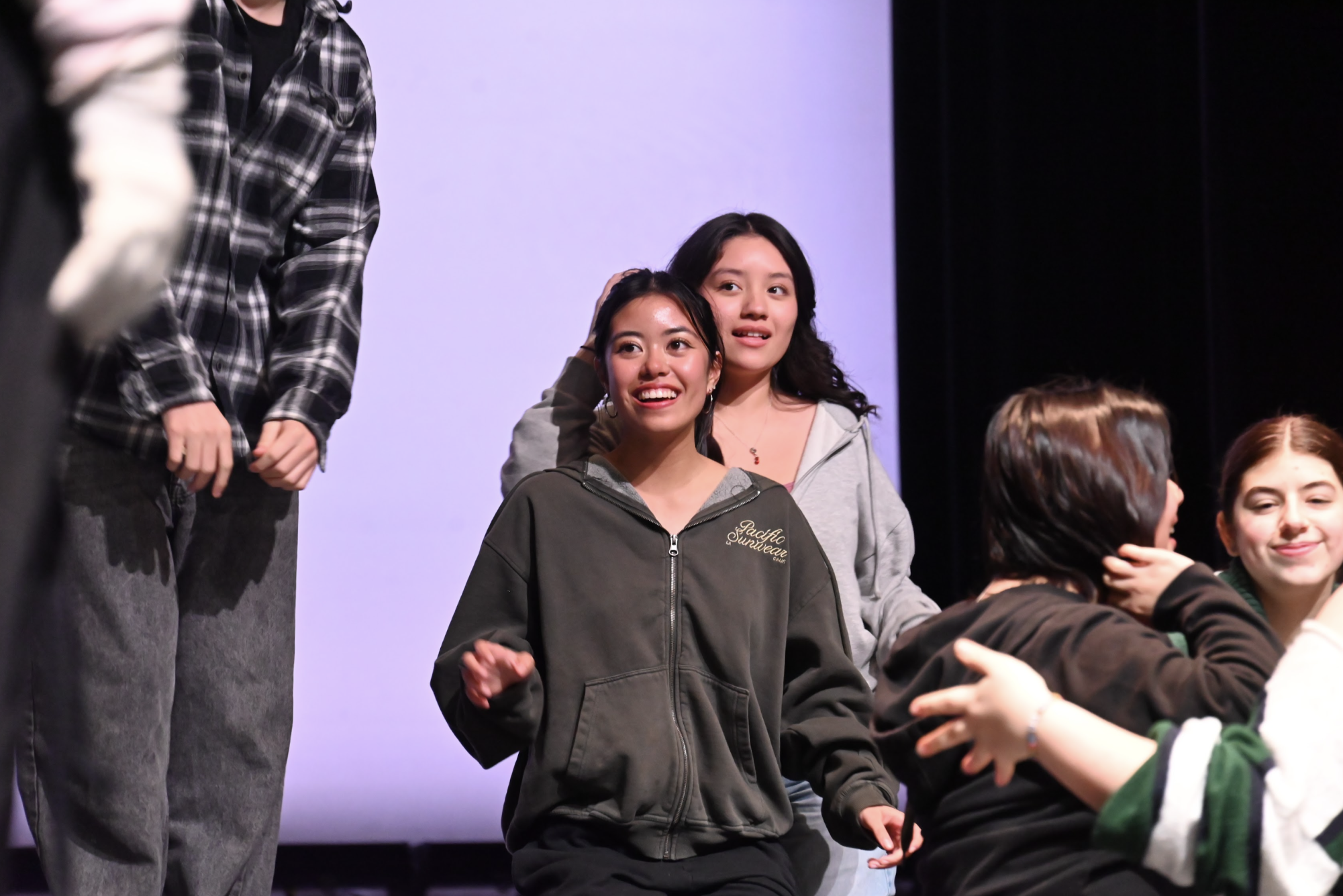 The "Mamma Mia!" cast at Van Nuys High School embraces the challenge of mastering music and dance routines, showcasing dedication and teamwork as they prepare for the March opening.